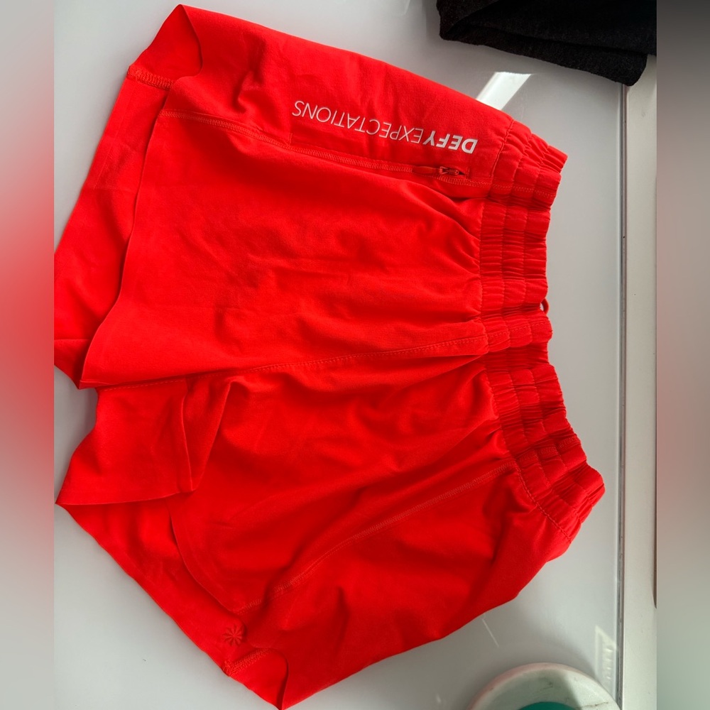 Athleta Girl Bright Orange shorts NEVER WORN